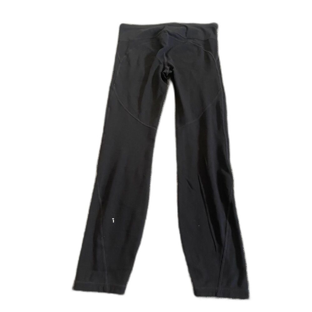 GapFit black athletic leggings feature specialized curved compression seams M
